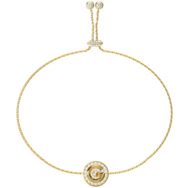 Gold bracelet with a circular clasp on a white background