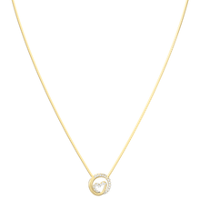 Gold necklace with a heart-shaped pendant on a white background