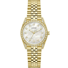 Gold-tone Guess watch with a round mother-of-pearl dial, crystal-encrusted bezel, and matching gold-tone link bracelet on a white background.