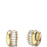 A pair of gold huggie hoop earrings with a row of clear baguette-cut stones on the front, shown from side and back angles against a solid white background.