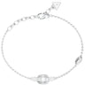 A silver chain bracelet with a central geometric setting holding a clear baguette-cut gemstone, flanked by small clear stones, on a plain white background.