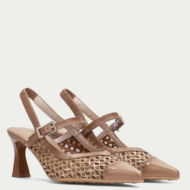Pair of beige high-heeled shoes with woven design on a light gray background