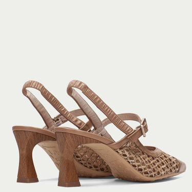 back of brown high heel shoes