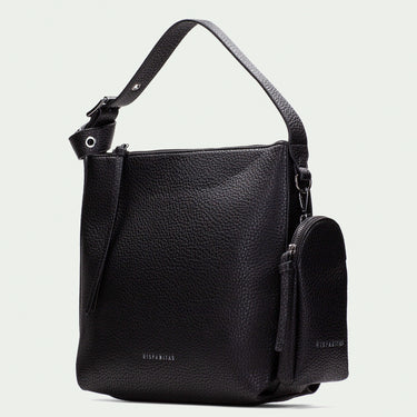 Black leather handbag with a detachable strap on a light gray background