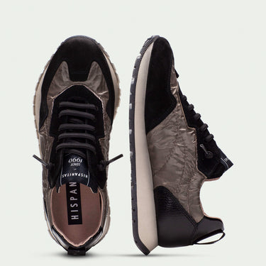 Pair of black and brown sneakers with 'Hispanitas' branding on a light gray background
