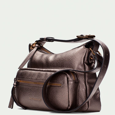 Brown leather handbag on a light gray background