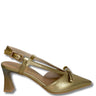 Gold high-heeled shoe with a strap on a white background