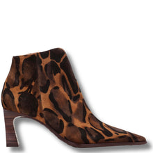 A pointed-toe ankle boot with a brown and black leopard print suede upper and a dark wood-look block heel, shown on a white background with a drop shadow.