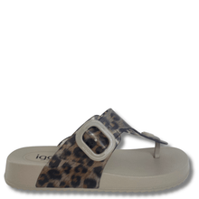 Beige sandal with leopard print strap on a white background