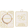 Joma Jewellery Friendship affirmation card bracelet set, featuring a pink and gold beaded bracelet on a cream card with gold foil designs, shown alongside its matching hanging card.