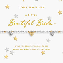 Joma Jewellery bracelet with heart charms on a white background with stars