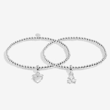 Two silver bracelets with heart and star charms on a white background