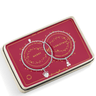 Two silver bracelets with charms on a red Joma Jewellery box.
