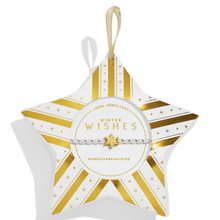 Star-shaped packaging with gold stripes and 'Winter Wishes' text, featuring a bracelet on a white background.