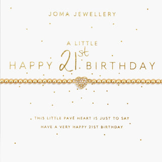 A gold beaded bracelet with a pavé heart charm and delicate chain, displayed on a white card with gold text celebrating a 21st birthday.
