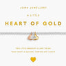 Joma Jewellery 'Heart of Gold' bracelet packaging with gold heart charm on a white background