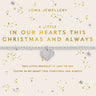 Joma Jewellery Christmas-themed bracelet on a cream card. The bracelet features a silver-toned band with a central heart-shaped crystal charm.