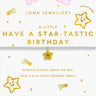 A Joma Jewellery 'A Little Have A Star-Tastic Birthday' gift set on a white card. The set includes a delicate silver chain bracelet with a gold star charm and a pink 'JOMEE'S' sticker at the top.