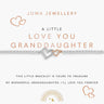 A delicate bracelet with a silver heart charm and rose gold heart accent, displayed on a white Joma Jewellery gift card with matching text.