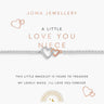 A delicate bracelet from Joma Jewellery displayed on its white gift card. The bracelet features a silver-toned chain with a central heart motif, where one half is set with clear crystals and the other is rose gold.