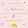 A silver bracelet with a pink star charm displayed on a light pink Joma Jewellery card with gold text and decorative dots.