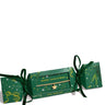 A gold chain necklace with a star pendant, presented in a green Christmas-themed gift box with green ribbon ties. The box features gold 'MERRY CHRISTMAS' and 'JOMA JEWELLERY' text and star patterns, set against a plain white background.