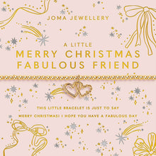 A Joma Jewellery Christmas-themed bracelet on its original backing card. The bracelet is a delicate gold chain with a central gold heart-and-stars charm.