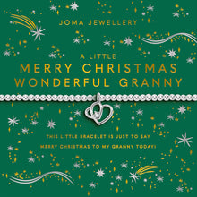 Joma Jewellery bracelet packaging with festive design and text on a green background