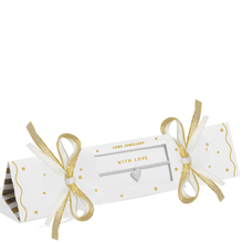 Jewellery packaging with gold ribbons on a white background