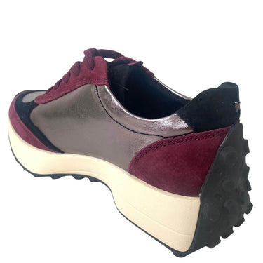 Sneaker with maroon and gray design on a white background