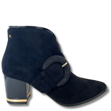 ladies black suede boots with pointed toe and large sparkly buckle