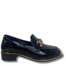 A black leather loafer with a low block heel and a gold-tone horsebit detail on the strap, shown from a side profile against a white background.