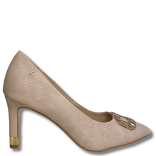Beige high-heeled shoe with decorative embellishment on a white background