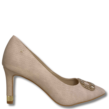 Beige high-heeled shoe with decorative embellishment on a white background