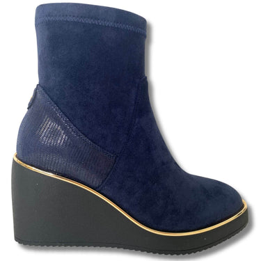 Blue wedge ankle boot on a white background