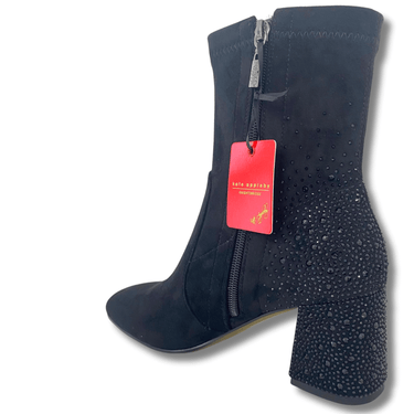 Black boot with rhinestone details and a red tag on a white background