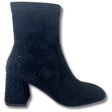 black ankle boot with rhinestone embellishments on a white background