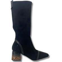 Black knee-high boot with a leopard print block heel on a white background