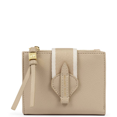 A beige pebbled leather zip-around card holder wallet with a central white and beige fabric stripe, a matching leather tab, and a gold-tone zipper pull on a white background.