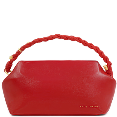Red handbag with braided handle on a white background