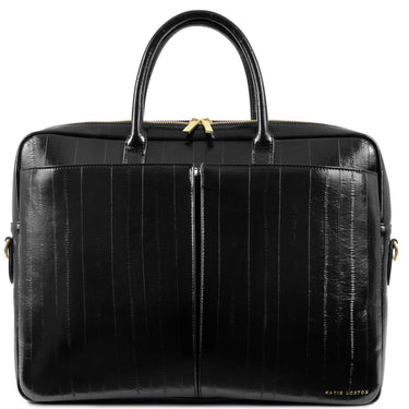 A black leather briefcase with a crocodile-embossed texture, featuring dual top handles, a front zipper, and gold-tone hardware, including a small 'Katie Joyson' logo on the bottom right corner.