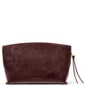 A dark brown leather clutch bag with a distressed texture, featuring a gold-embossed 'KATIE LONDON' logo and a matching leather tassel zipper pull on a white background.