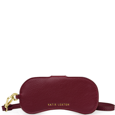 Red sleep mask with gold zipper and 'Katie Loxton' branding on a white background