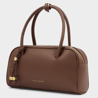 Brown handbag with gold accents on a light gray background