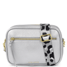 Silver crossbody bag with a patterned strap on a white background