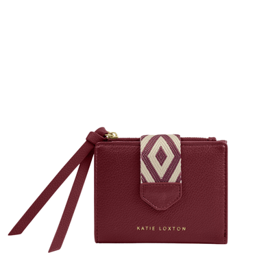 Maroon wristlet with decorative strap and 'Katie Loxton' branding on a white background
