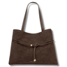 Brown suede handbag with a drawstring on a white background