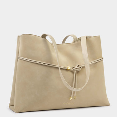 Beige handbag with drawstring on a light gray background