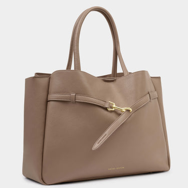 Brown leather handbag with a gold zipper on a light gray background