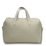 pale green toned handbag with 'katie loxton' branding on a white background